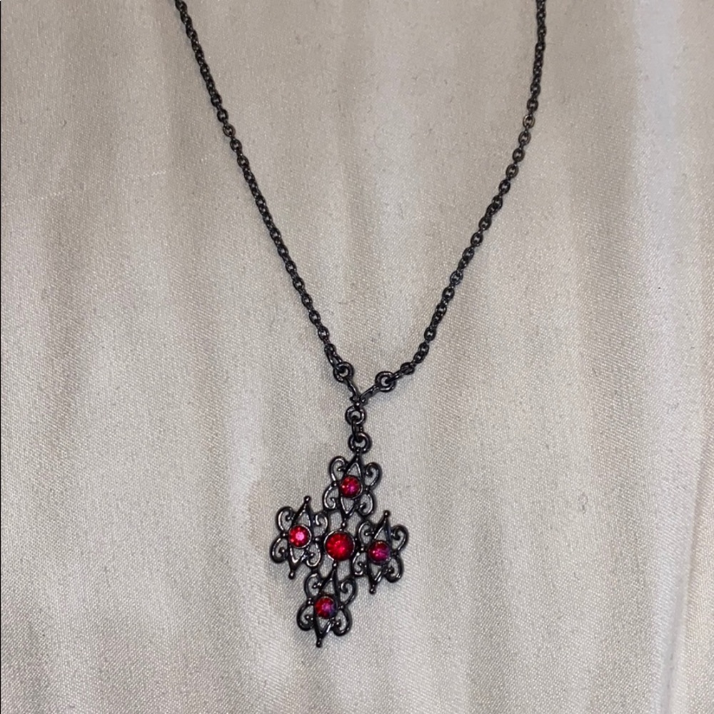 Cross necklace with burgundy accents